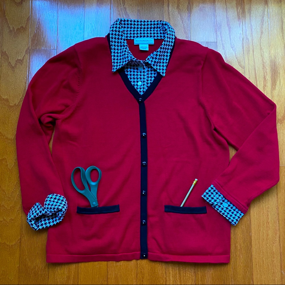 Black piped red sweater over houndstooth “shirt”